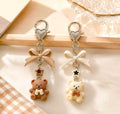 2pcs Unisex Cartoon Resin Bear Pendant With Bow, Star And Bead Accessories